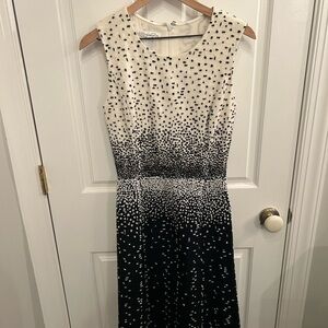 Oscar De La Renta sleeveless textured dotted black and white dress.